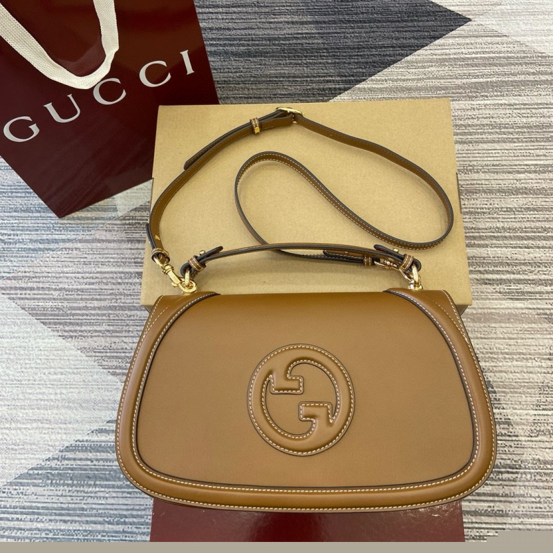 G*u*i top handle bags